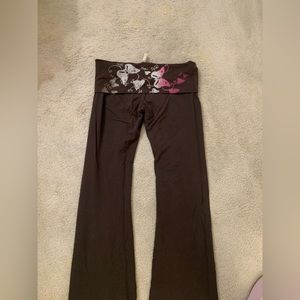 Brown so low bell bottom pants with butterfly details on back